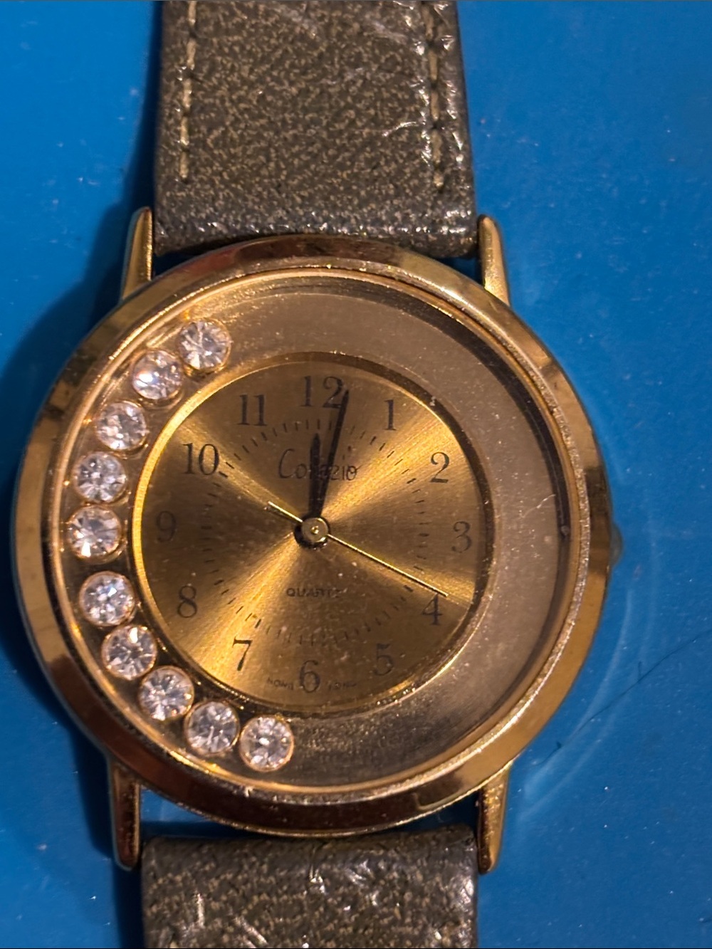 Gold-Tone Women's Watch with Crystal Accents and Gray Strap